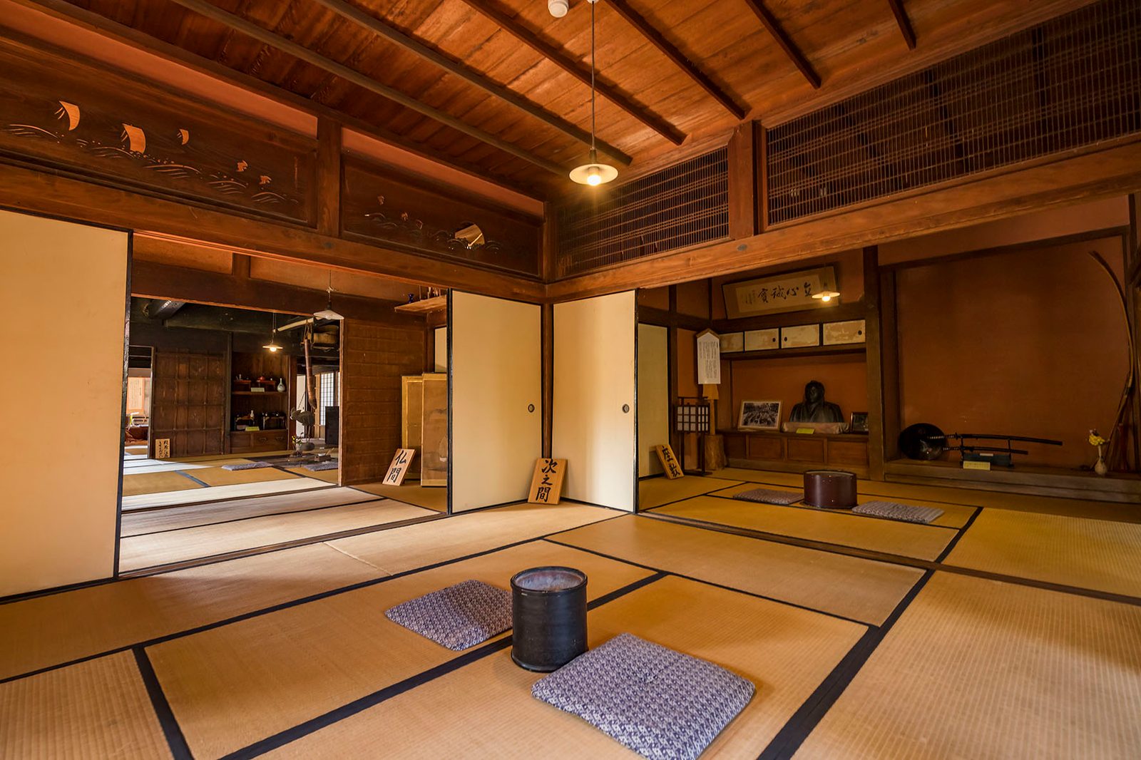 Tatami rooms with sliding doors inside a preserved samurai house in Izumi Fumoto