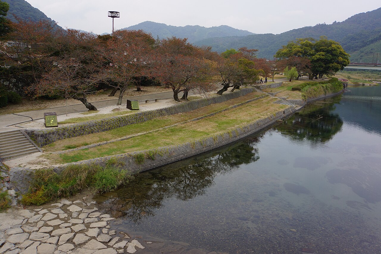 The tree-lined riverside promenade along the Nishiki River in Iwakuni