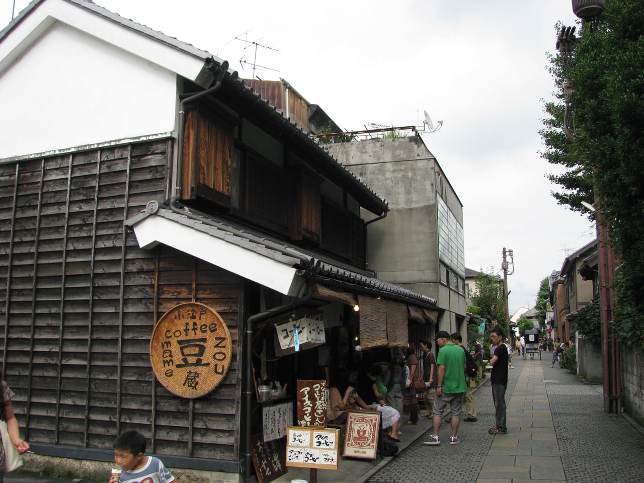 A quiet lane of traditional candy shops in Kashiya Yokocho, the old sweets alley in Kawagoe's Motomachi district.