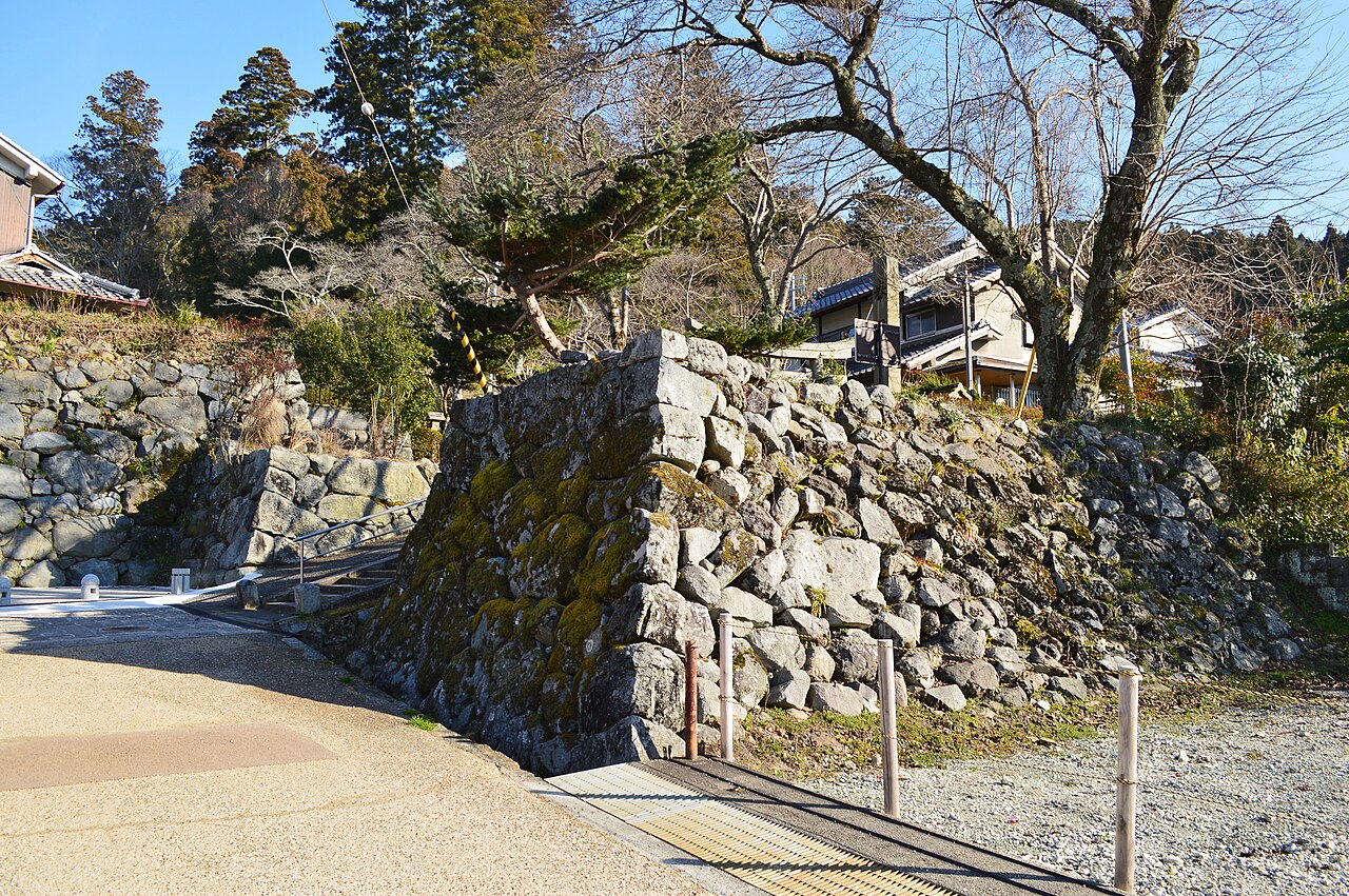 Moss-covered stone walls and a gate path at the Uda-Matsuyama Castle site